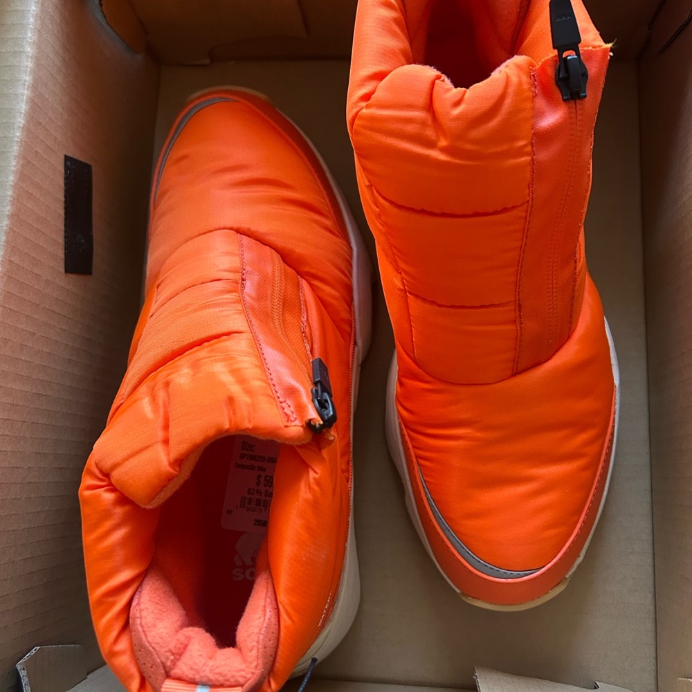 Sorel Orange Waterproof Boots
New in box